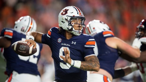 Auburn Tigers quarterback Robby Ashford (9) drops back to pass in the first quarter Auburn Tigers take on Mississippi Rebels at Jordan-Hare Stadium in Auburn, Ala., on Saturday, Oct. 21, 2023. 